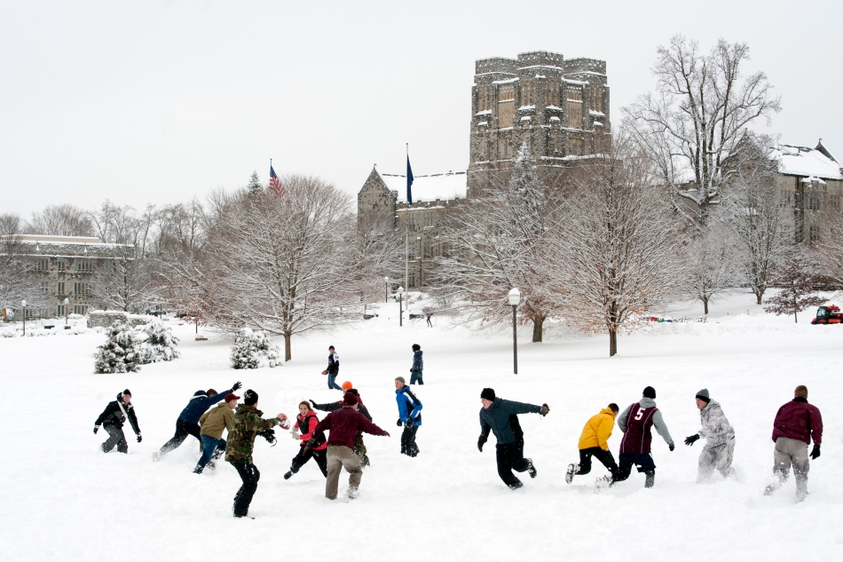 Students play football on Virginia Tech's drillfield after classes were cancelled on February 13 due to a record 19 inches of snow overnight.